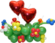 Композиция из шариков "Цветочная поляна" с сердцами
